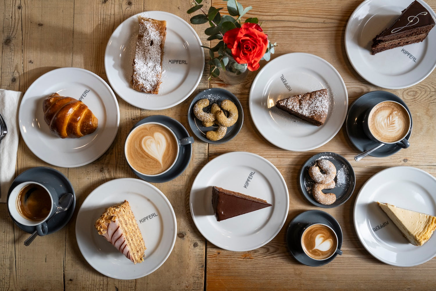 Slices of Sachertorte, Topfentorte, Kipferls and Coffee.