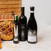 Austrian Excellence hamper contents arranged showing Linzer Torte, Vanillekipferl and Vienna pantry items