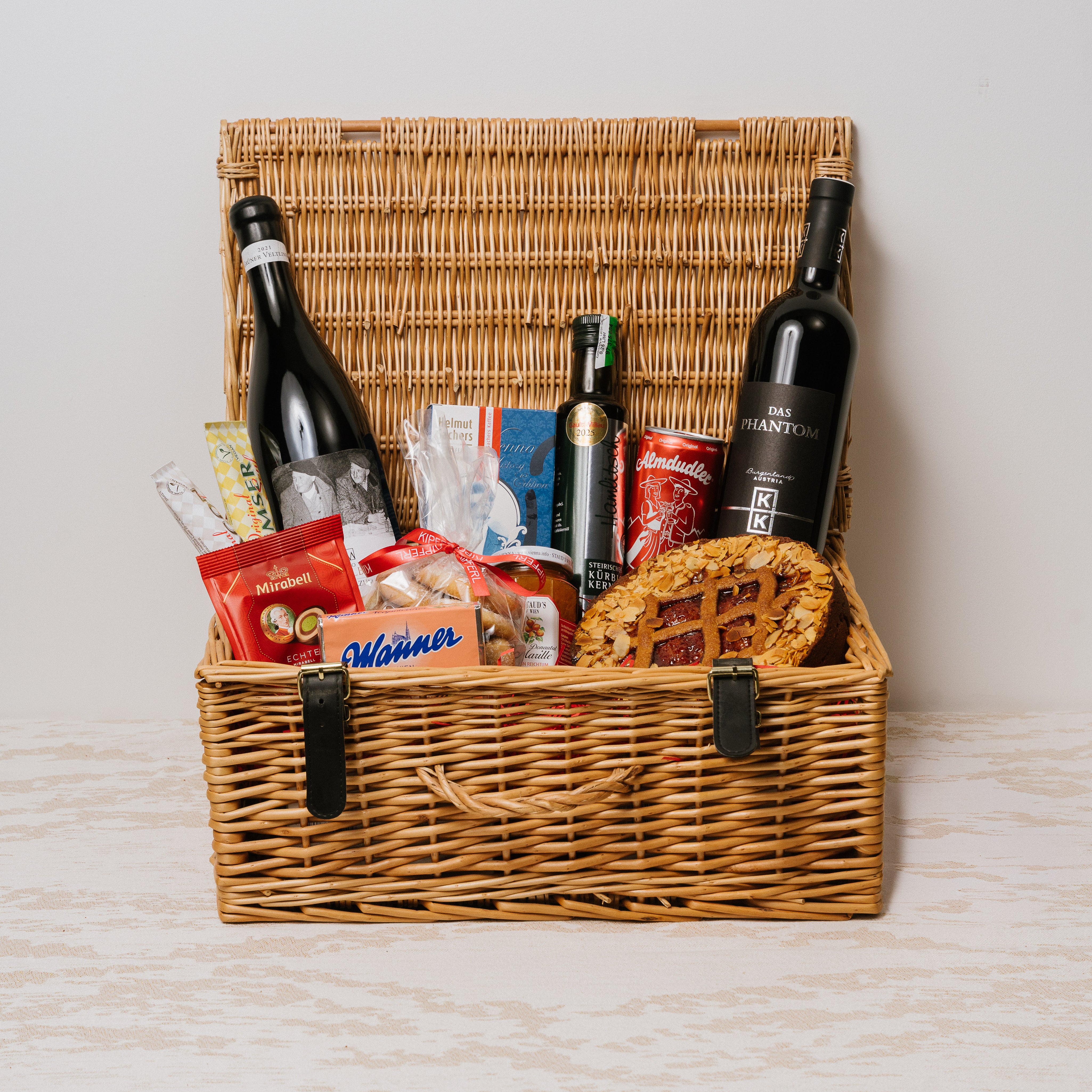 Austrian Excellence hamper close-up of Gruner Veltliner Anno Dazumal and Kirnbauer Phantom wine bottles