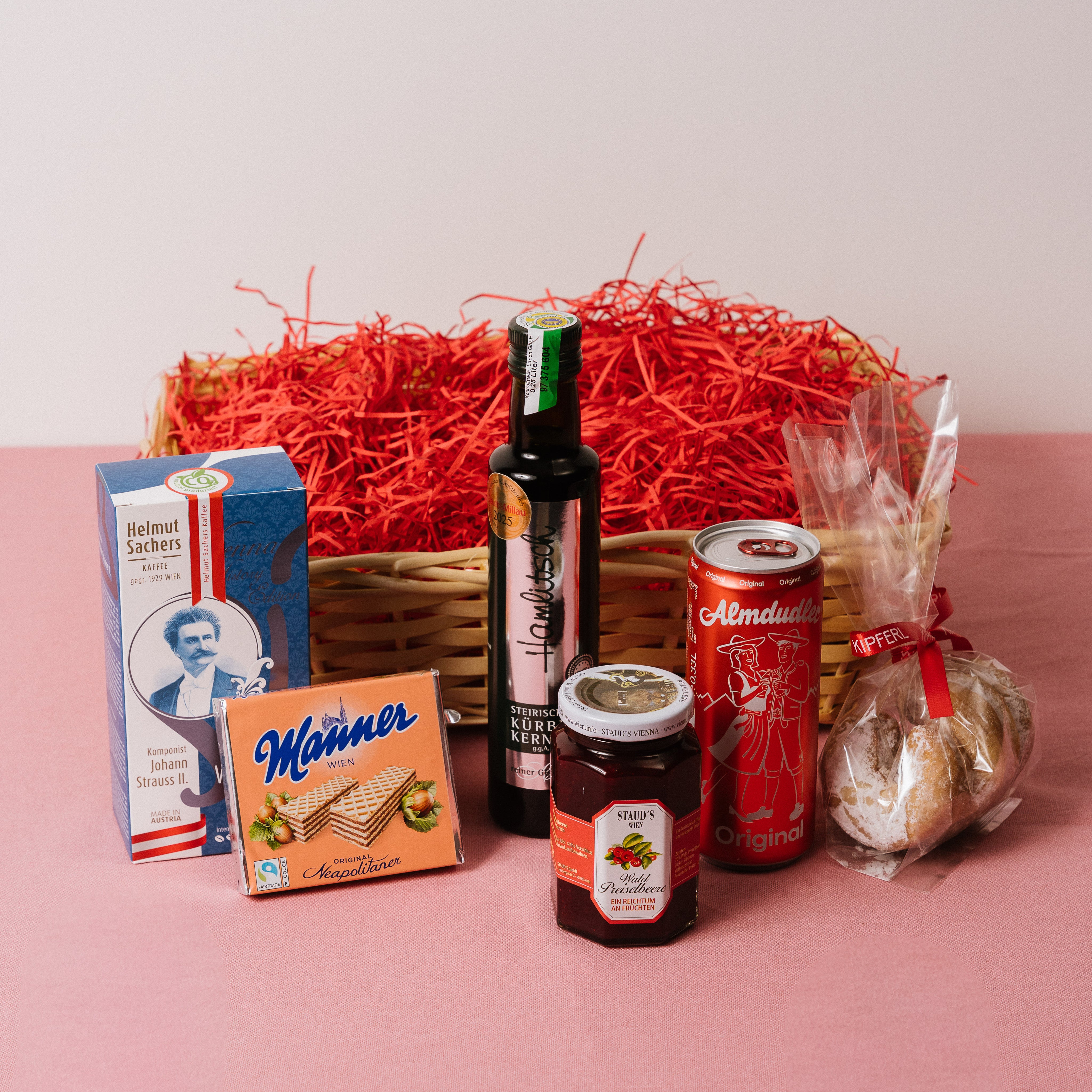 Small Austrian gift hamper presented in wicker basket
