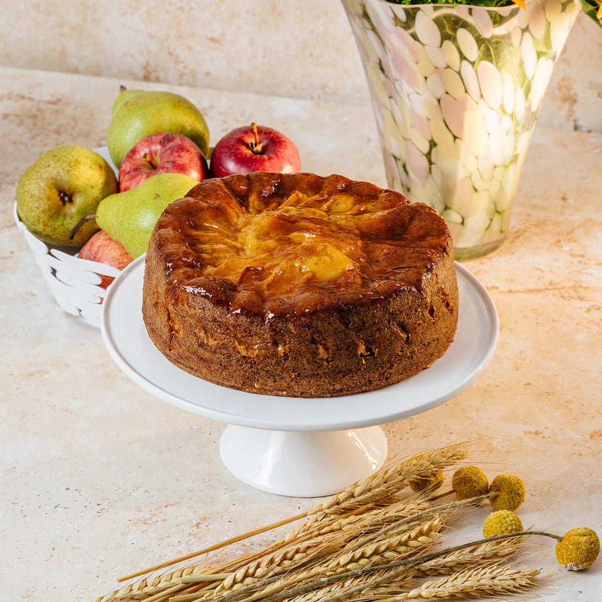 Jewish Apple Cake with apples on a table