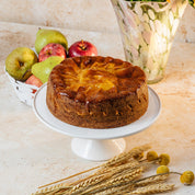 Jewish Apple Cake with apples on a table