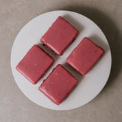 Group of Punschkrapferl Austrian pastries arranged for serving